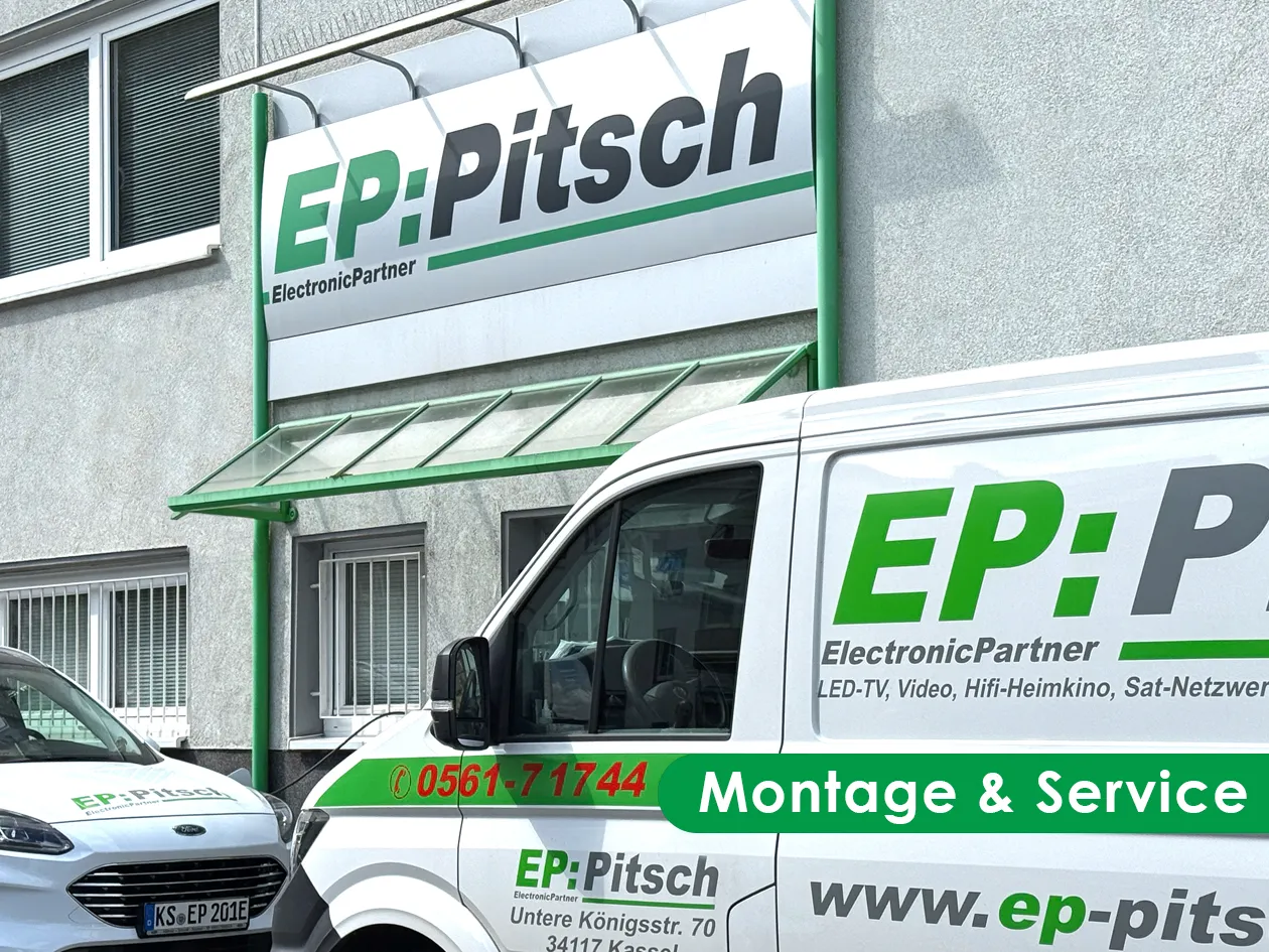 EP:Pitsch, Montage & Service: Firmenwagen vor dem Geschäft